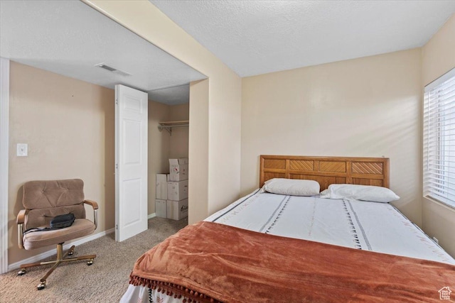 7217 W Mccuiston Ave S, Herriman, UT 84096 - carpeted bedroom with baseboards, a textured ceiling, and visible vents
