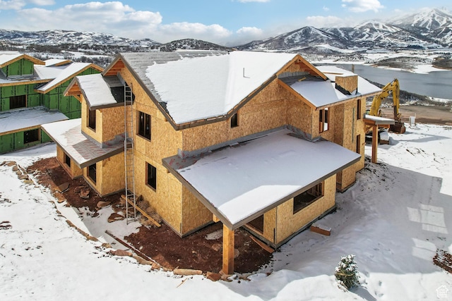 10646 N Reflection Rdg, Hideout, UT 84036 - snowy aerial view featuring a mountain view