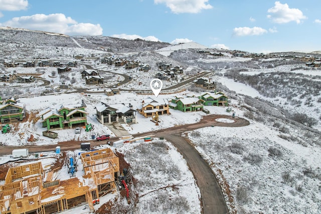 10646 N Reflection Rdg, Hideout, UT 84036 - snowy aerial view with a mountain view and a residential view