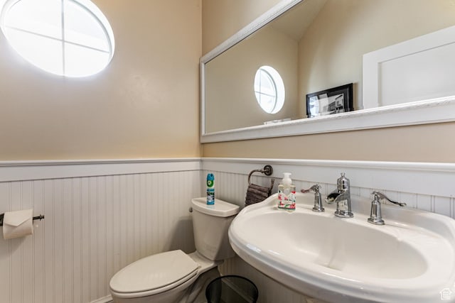 2503 W State Road 32, Peoa, UT 84061 - bathroom featuring a wainscoted wall, a sink, and toilet