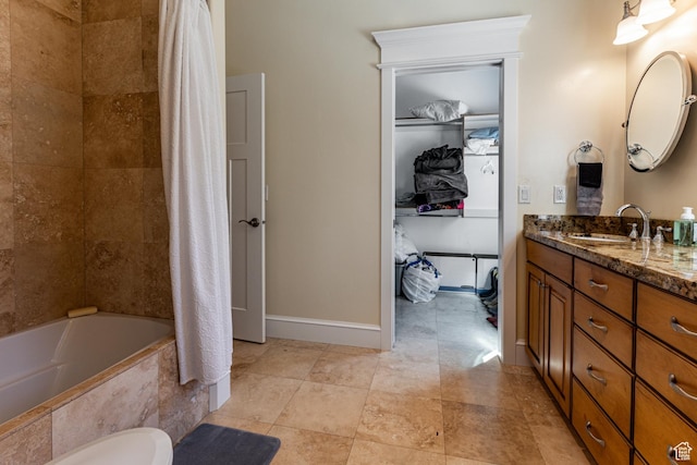 2503 W State Road 32, Peoa, UT 84061 - bathroom with tiled shower / bath combo, vanity, and baseboards