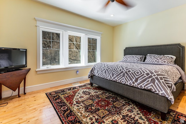 2503 W State Road 32, Peoa, UT 84061 - bedroom featuring a ceiling fan, wood finished floors, baseboards, visible vents, and recessed lighting