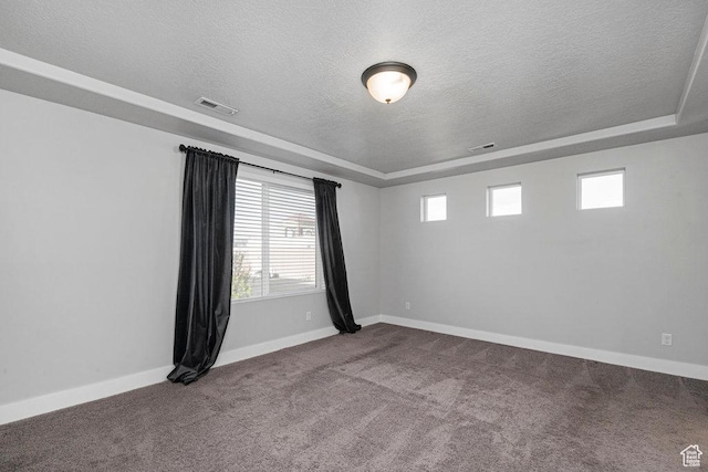 1146 W 1875 S, Syracuse, UT 84075 - empty room featuring baseboards, dark carpet, a textured ceiling, and visible vents