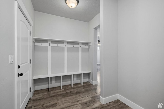 1146 W 1875 S, Syracuse, UT 84075 - mudroom featuring baseboards, a textured ceiling, and wood finished floors