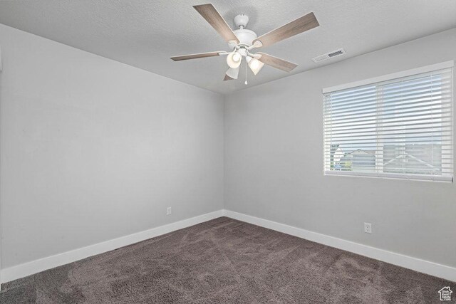 1146 W 1875 S, Syracuse, UT 84075 - spare room with dark colored carpet, a ceiling fan, baseboards, and visible vents