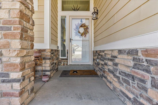 6403 W Muzzle Loader Dr, Herriman, UT 84096 - doorway to property featuring stone siding