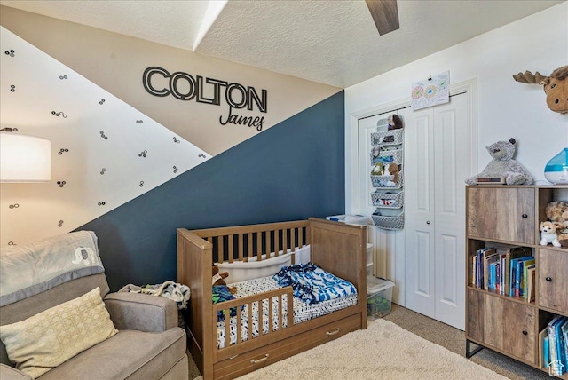 6403 W Muzzle Loader Dr, Herriman, UT 84096 - carpeted bedroom with a textured ceiling, a closet, and a ceiling fan
