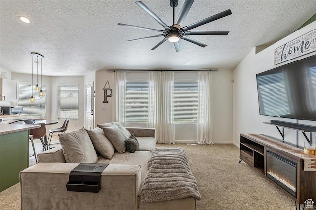 6403 W Muzzle Loader Dr, Herriman, UT 84096 - living area featuring ceiling fan, light carpet, a textured ceiling, and baseboards
