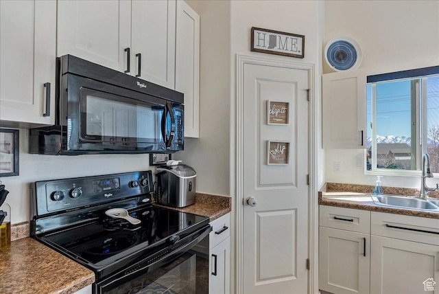 6403 W Muzzle Loader Dr, Herriman, UT 84096 - kitchen featuring white cabinets, a sink, and black appliances