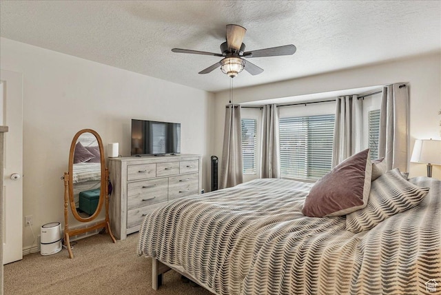 6403 W Muzzle Loader Dr, Herriman, UT 84096 - bedroom with a textured ceiling, a ceiling fan, and light colored carpet