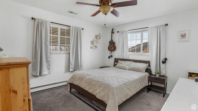 4535 S Ridgeline Dr, Ogden, UT 84405 - bedroom featuring baseboard heating, visible vents, ceiling fan, and carpet