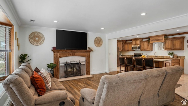4535 S Ridgeline Dr, Ogden, UT 84405 - living area with recessed lighting, ornamental molding, a fireplace, and visible vents