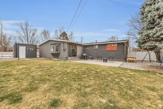 175 E Millerberg Dr S, Sandy, UT 84070 - back of property featuring fence, entry steps, a lawn, an outbuilding, and a shed
