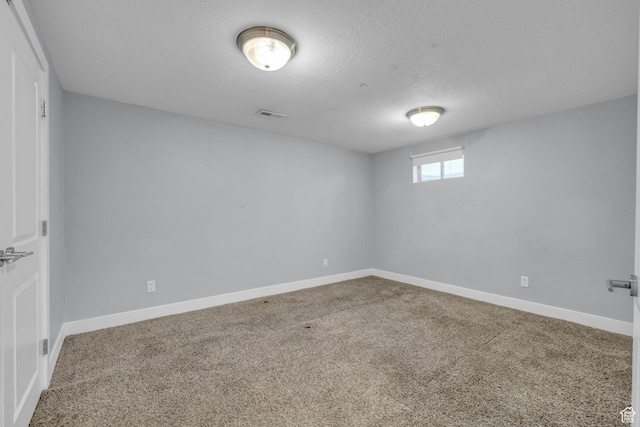 175 E Millerberg Dr S, Sandy, UT 84070 - below grade area with carpet floors, a textured ceiling, baseboards, and visible vents