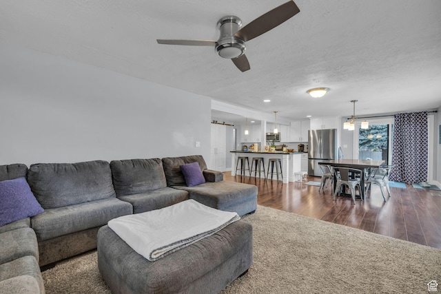 175 E Millerberg Dr S, Sandy, UT 84070 - living room with a ceiling fan, dark wood-style flooring, recessed lighting, and a textured ceiling