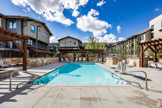 3788 Blackstone Dr Unit 19, Park City, UT 84098 - community pool with a pergola, a patio area, a residential view, and fence
