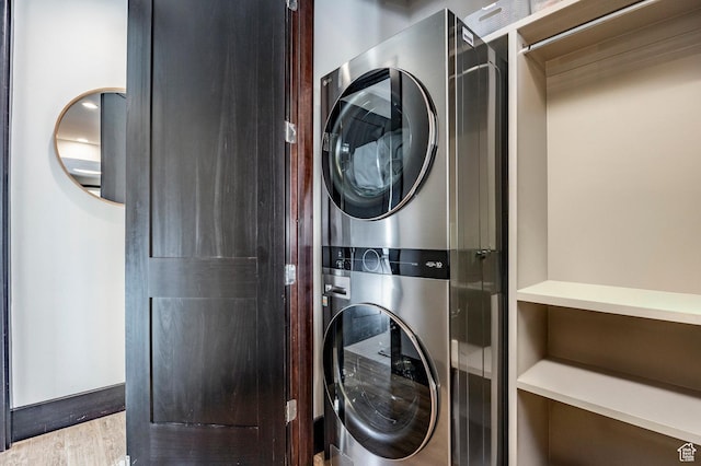3788 Blackstone Dr Unit 19, Park City, UT 84098 - clothes washing area with stacked washer and clothes dryer, wood finished floors, and laundry area