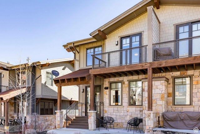 3788 Blackstone Dr Unit 19, Park City, UT 84098 - rear view of house featuring a balcony and stone siding