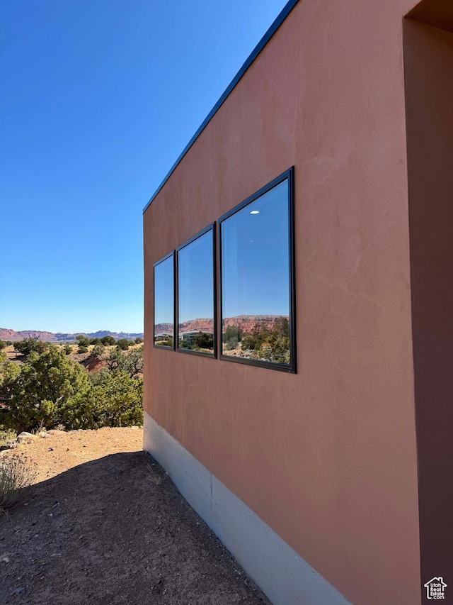 405 W 1000 N, Torrey, UT 84775 - view of side of home featuring stucco siding