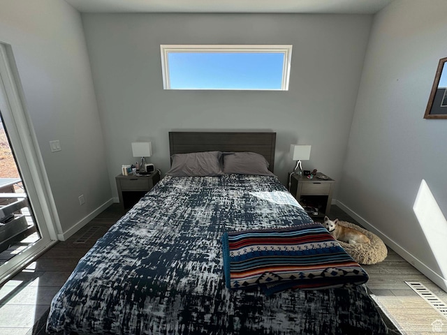 405 W 1000 N, Torrey, UT 84775 - bedroom featuring baseboards, visible vents, and wood finished floors