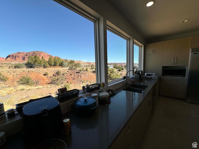 405 W 1000 N, Torrey, UT 84775 - kitchen with a sink, built in appliances, modern cabinets, recessed lighting, and a mountain view
