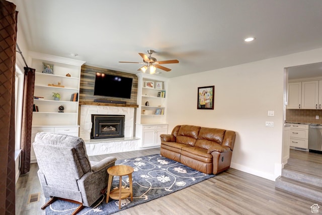 410 N 250 W, Springville, UT 84663 - living room featuring a ceiling fan, a fireplace, wood finished floors, baseboards, and recessed lighting