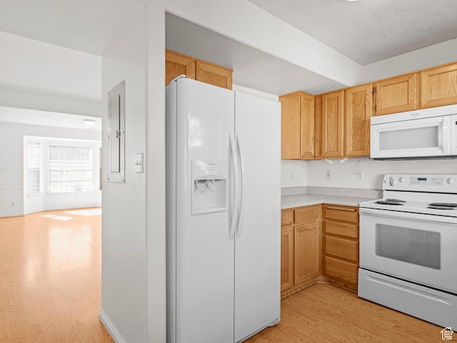 932 Independence Ave, Provo, UT 84604 - kitchen featuring white appliances, light countertops, light wood-style flooring, and light brown cabinetry