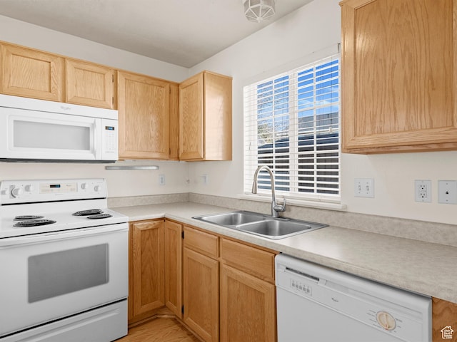 932 Independence Ave, Provo, UT 84604 - kitchen featuring light countertops, a sink, light brown cabinets, and white appliances
