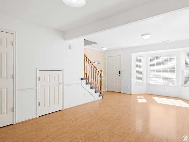 932 Independence Ave, Provo, UT 84604 - entrance foyer featuring baseboards, light wood-style flooring, and stairway