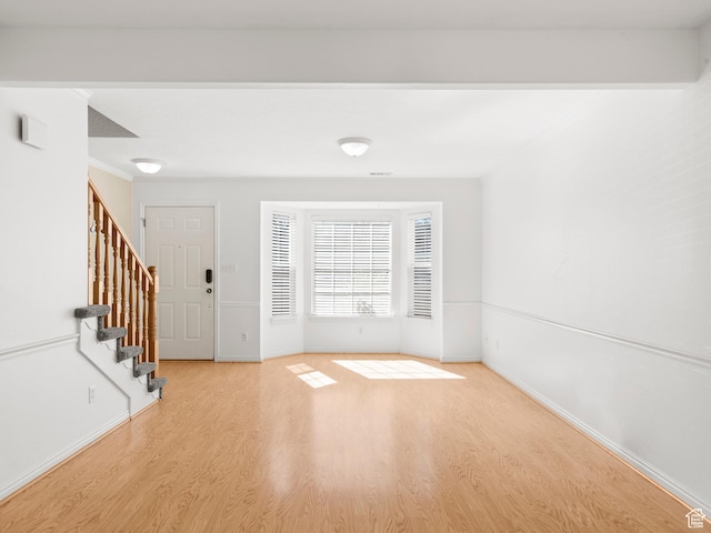 932 Independence Ave, Provo, UT 84604 - foyer with stairs, light wood-style floors, and baseboards