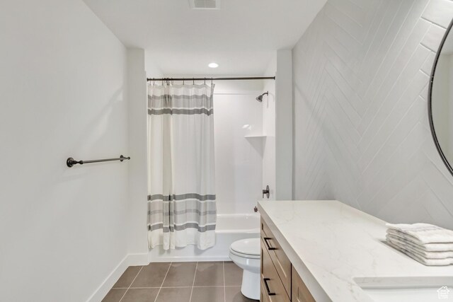 813 S 1260 W Unit 111, Heber City, UT 84032 - full bathroom with toilet, vanity, shower / bath combo, tile patterned flooring, and baseboards