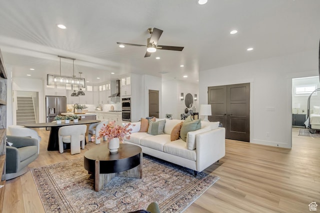 813 S 1260 W Unit 111, Heber City, UT 84032 - living area featuring a ceiling fan, recessed lighting, baseboards, and light wood-type flooring