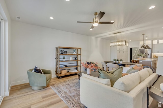 813 S 1260 W Unit 111, Heber City, UT 84032 - living area featuring baseboards, light wood-type flooring, ceiling fan, and recessed lighting