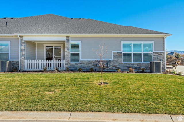 813 S 1260 W Unit 111, Heber City, UT 84032 - view of front of home with stone siding, fence, central AC, and a front yard