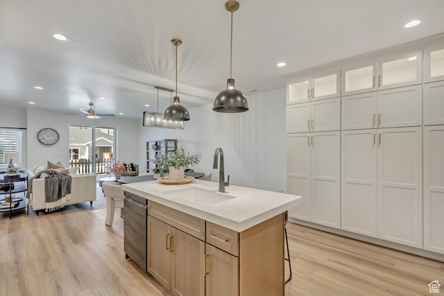 813 S 1260 W Unit 111, Heber City, UT 84032 - kitchen featuring a sink, decorative light fixtures, stainless steel dishwasher, and light wood finished floors