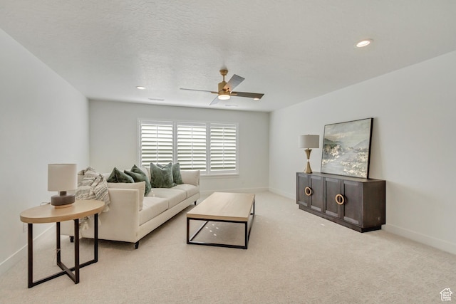 813 S 1260 W Unit 111, Heber City, UT 84032 - living area featuring carpet flooring, a textured ceiling, baseboards, ceiling fan, and recessed lighting