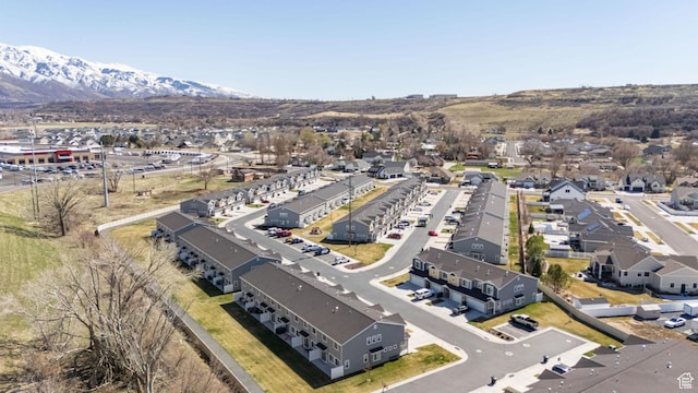 birds eye view of property featuring a residential view and a mountain view