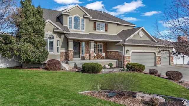 11773 S Twin Pines Ct, Draper, UT 84020 - view of front facade featuring stucco siding, a shingled roof, a garage, and a front yard