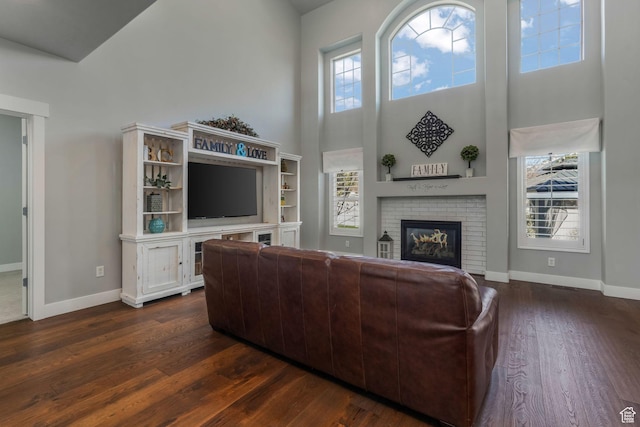 11773 S Twin Pines Ct, Draper, UT 84020 - living area featuring dark wood-style floors, baseboards, and a healthy amount of sunlight