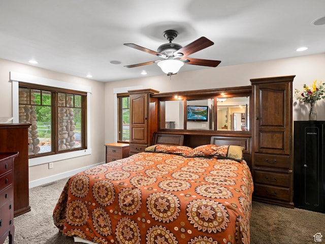carpeted bedroom with recessed lighting, visible vents, and baseboards