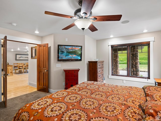 carpeted bedroom with baseboards, recessed lighting, and ceiling fan