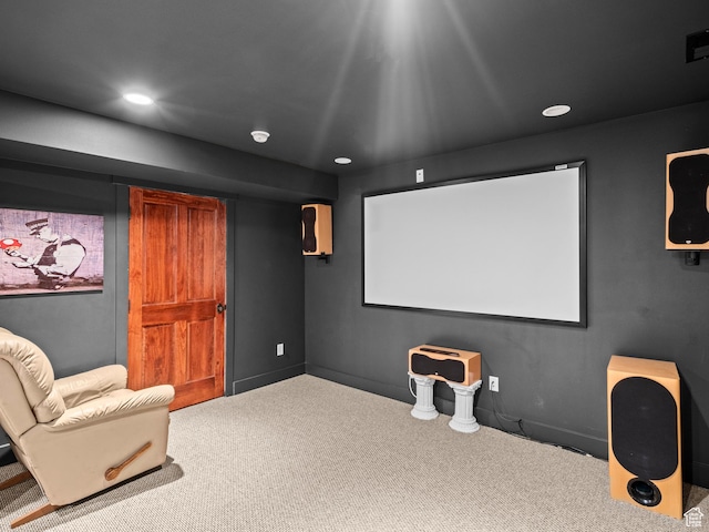 carpeted home theater room with recessed lighting