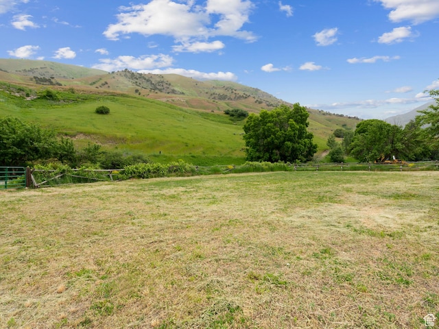 mountain view featuring a rural view