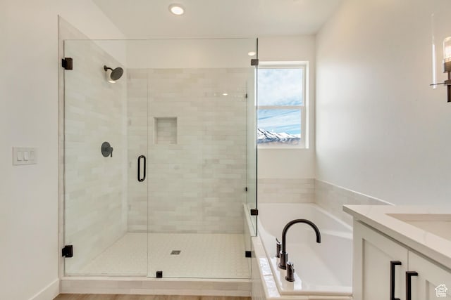 8077 N Bristle Cone Rd, Eagle Mountain, UT 84005 - full bath with a bath, vanity, and a shower stall