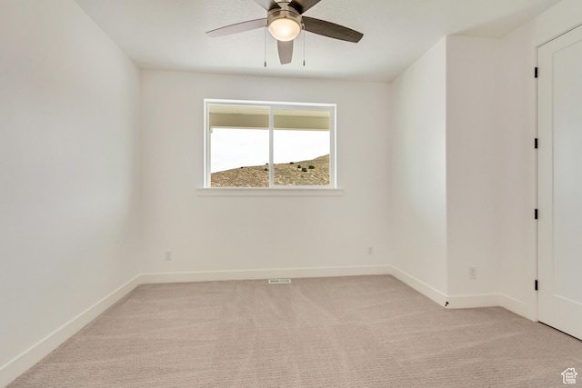 8077 N Bristle Cone Rd, Eagle Mountain, UT 84005 - unfurnished room featuring baseboards, visible vents, a ceiling fan, and light carpet