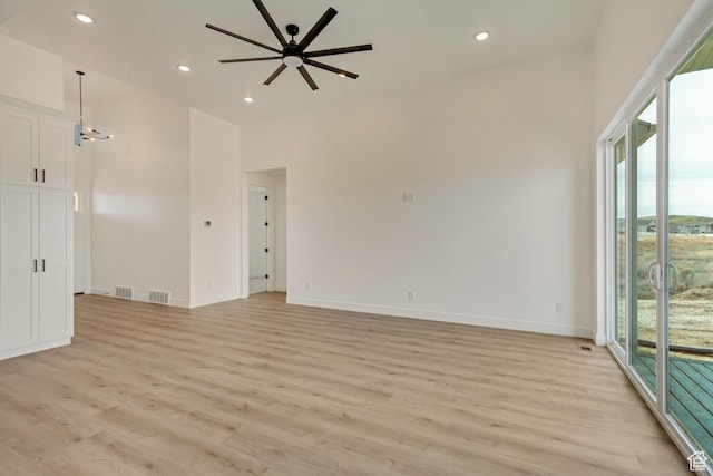 8077 N Bristle Cone Rd, Eagle Mountain, UT 84005 - interior space with light wood finished floors, visible vents, ceiling fan, and recessed lighting