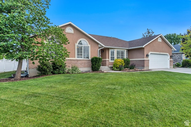 2793 W Misty Oaks Dr S, South Jordan, UT 84095 - ranch-style house with brick siding, stucco siding, a garage, and concrete driveway