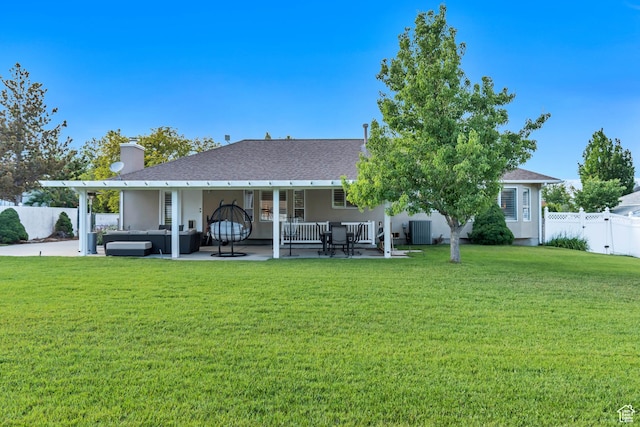 2793 W Misty Oaks Dr S, South Jordan, UT 84095 - back of property with an outdoor hangout area, a patio, central AC unit, and stucco siding