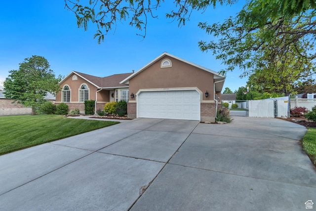 2793 W Misty Oaks Dr S, South Jordan, UT 84095 - single story home featuring stucco siding, concrete driveway, a garage, and brick siding