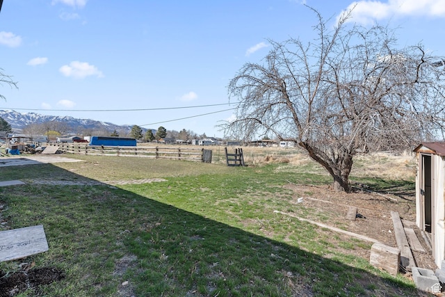 252 W Durfee St, Grantsville, UT 84029 - view of yard featuring a mountain view and a view of rural / pastoral area
